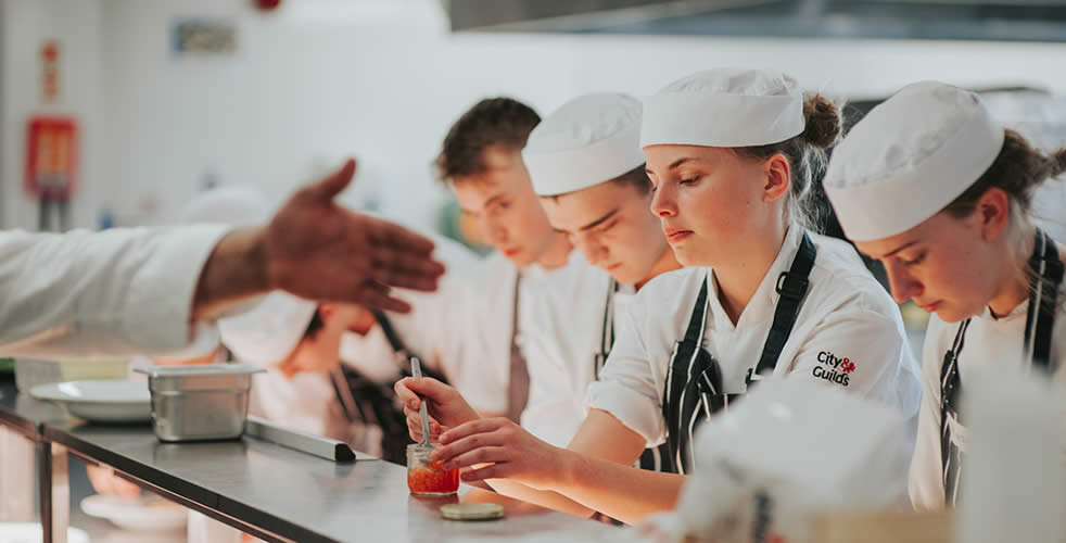 Michael Caines Academy students preparing food