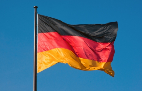 German flag against blue sky