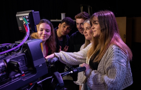 Group of students setting up a TV Studio camera