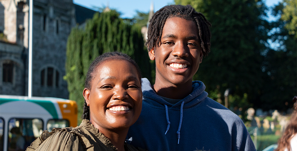 Parent and Child smiling together