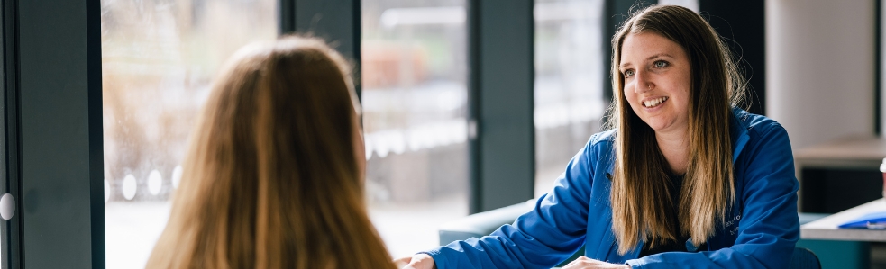 Adviser smiling at a student