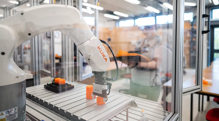 Students using machinery kuka