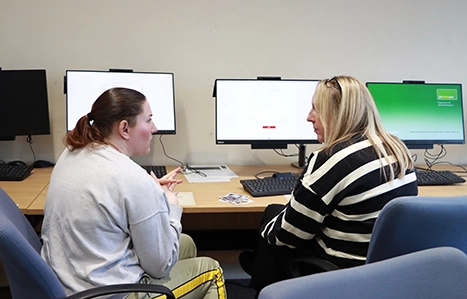 Job Seeker talking with staff