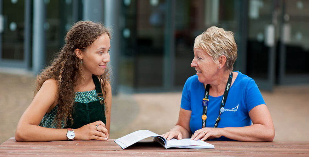 College Advisor talking to a student