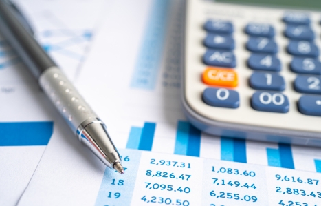 Calculator on chart graph for analysis account business trade