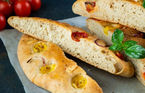 Homemade Italian Focaccia with basil and tomatoes