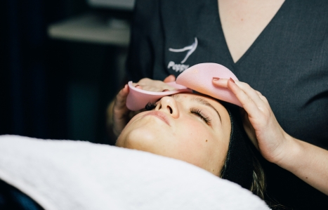 facial treatment being applied