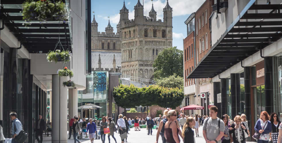Exeter City Centre on a sunny day filled with people