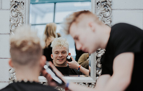 Apprenticeship student working in a barbers