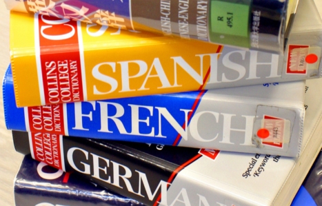Stack of language dictionary books