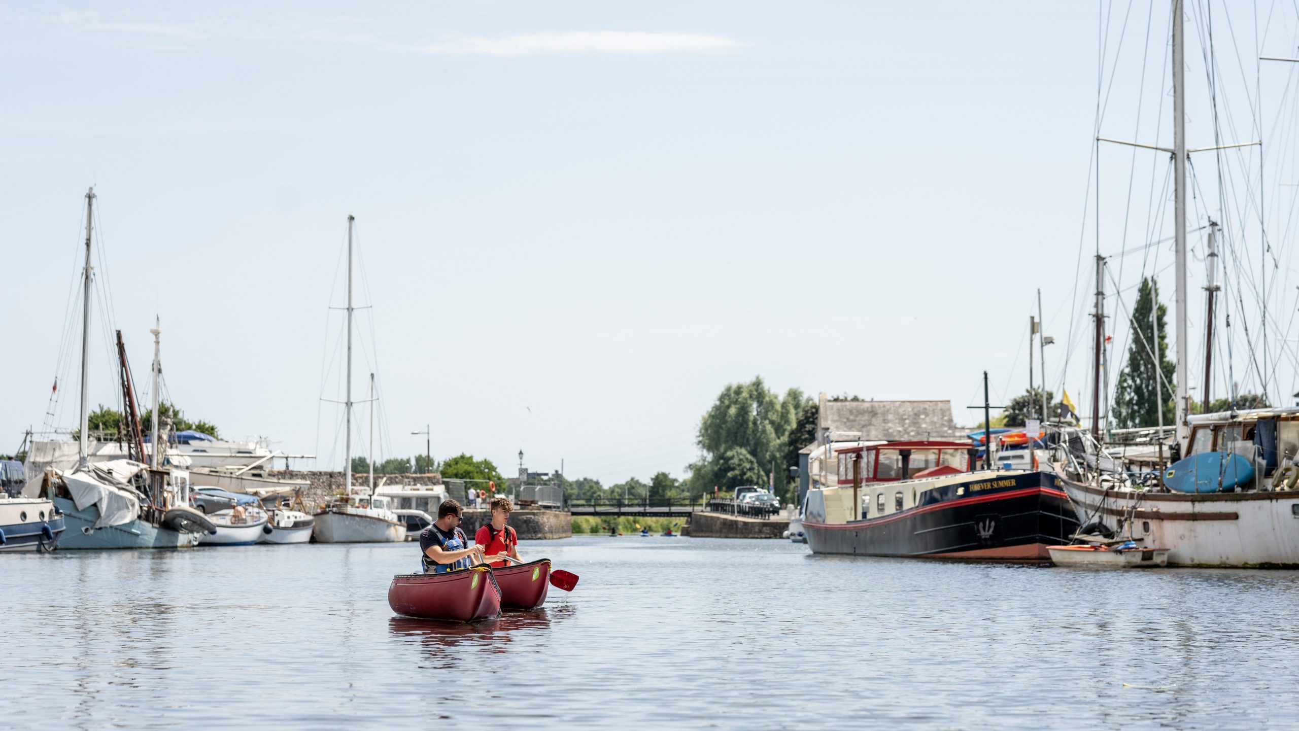 A Student and Teacher kayaking down at Haven Banks