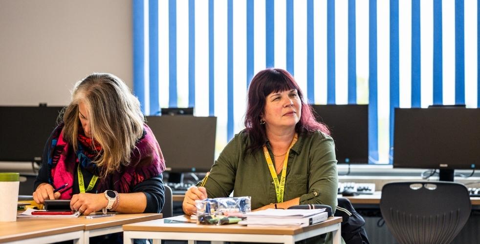 Two students working in class