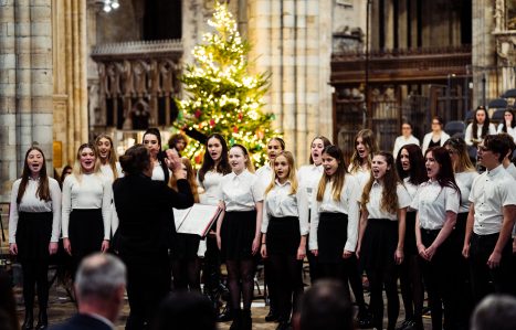 Students singing in the choir at the cathedral