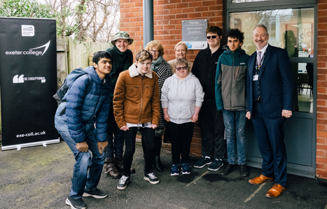 John Laramy stood outside the HILL (Hub for Independent living and learning) Building smiling at the camera