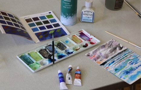 Watercolour painting with palette and inspiration booklet