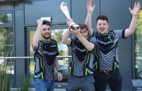 Three Esports students celebrating winning at the Esports festival