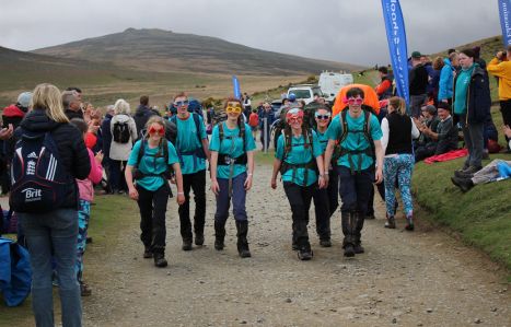 Ten Tors students walking towards the finishing line
