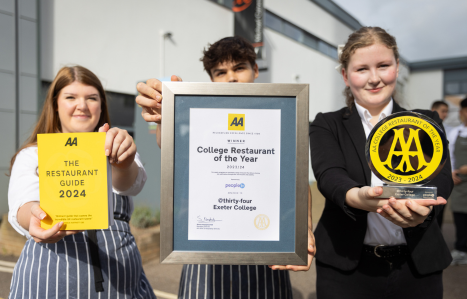Students hold out awards for college restaurant