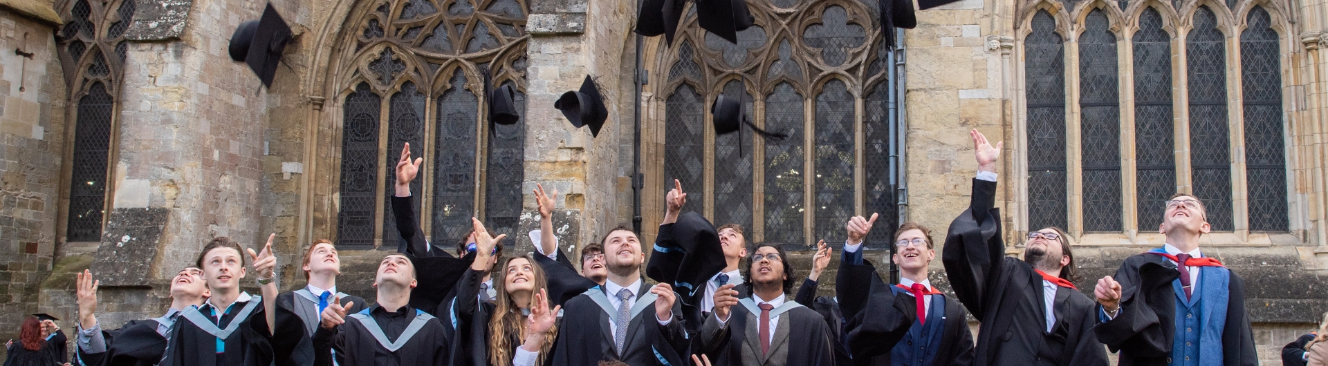 Graduates throwing hats