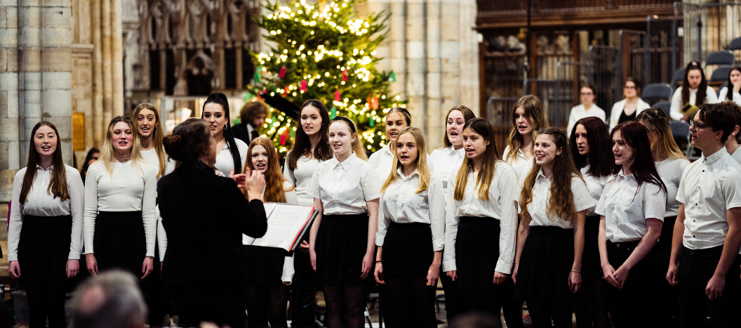 Group of students singing in the cathedral