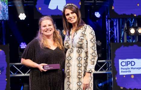 Molly receives her award at the CIPD awards.