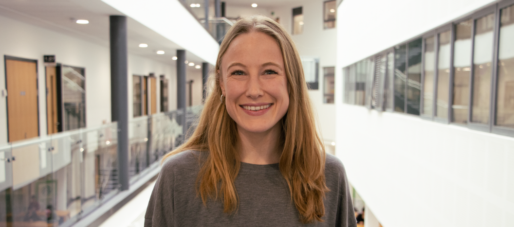 Member of staff smiling at the camera