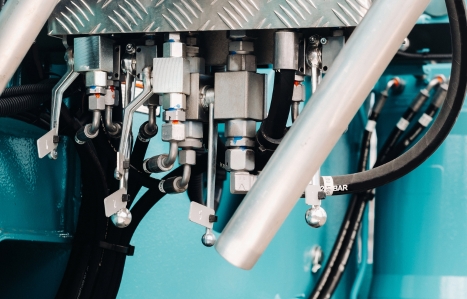 Hydraulic crane engine.The control system of the crane engine.