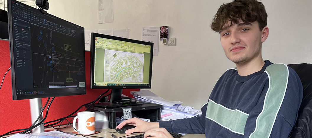 Apprenticeship student working at desk