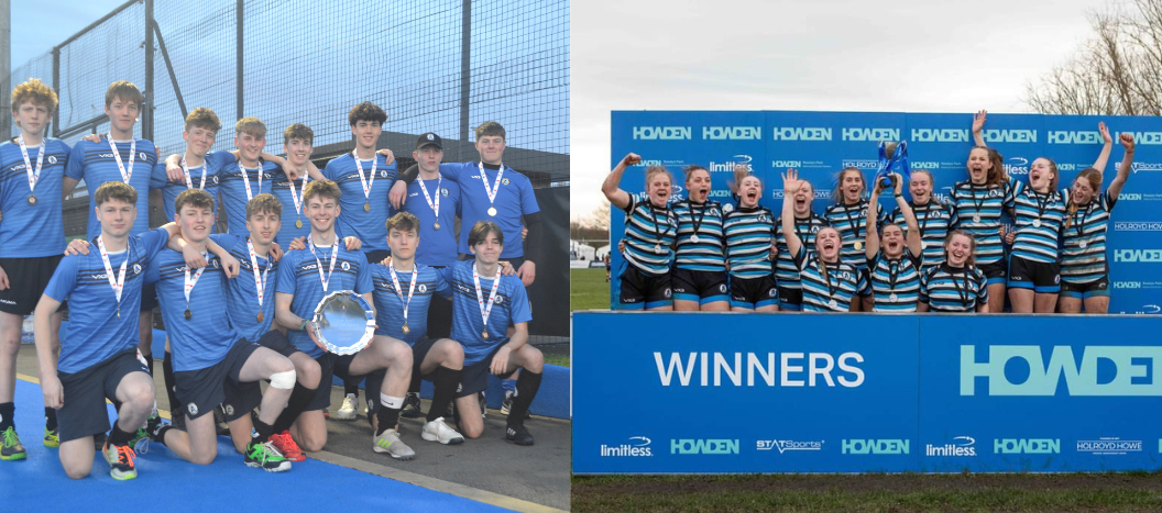 The winning teams hold up their trophys and smile at the camera