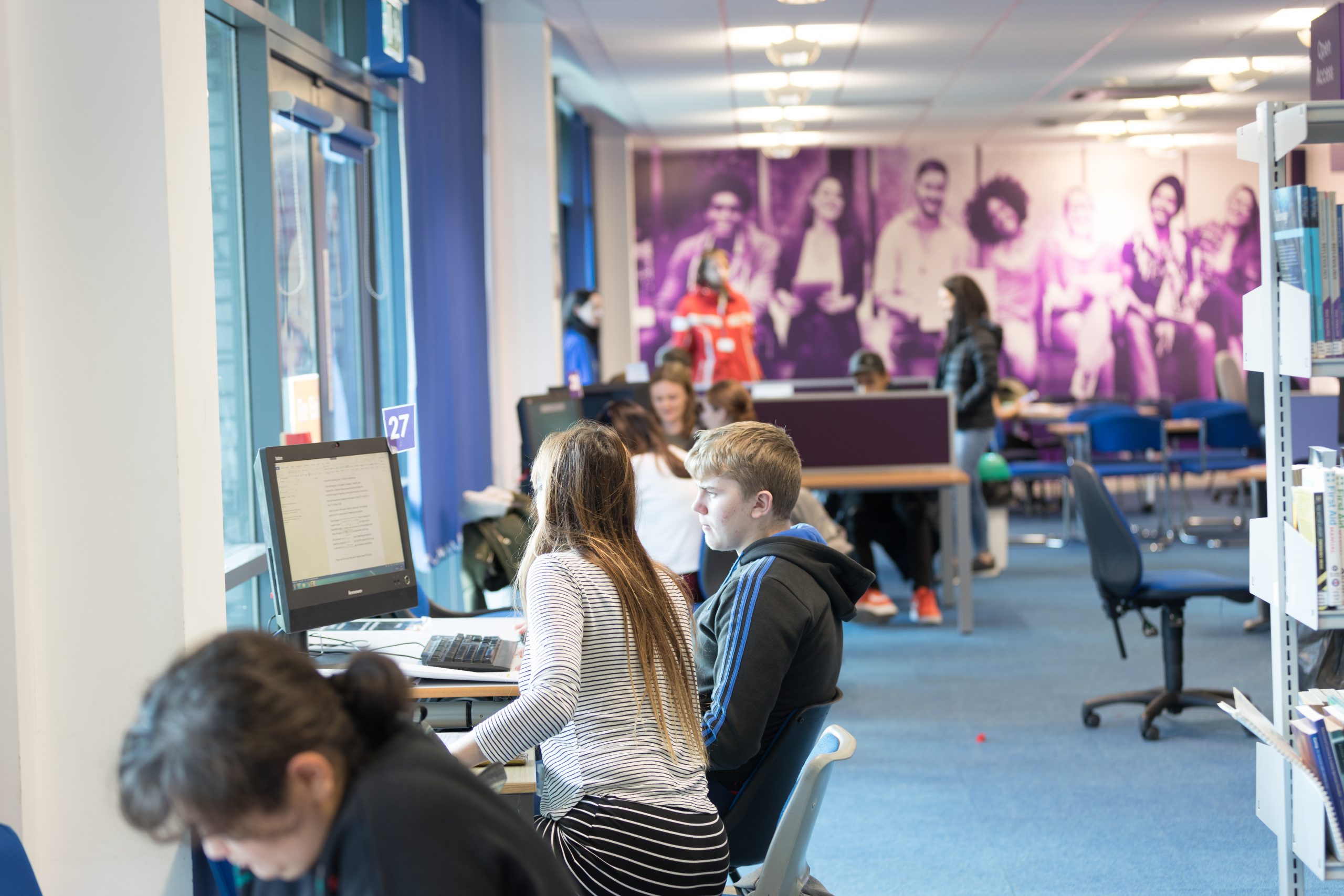 Students using the computers in the LRC