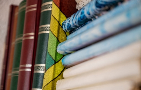 books stacked on a shelf