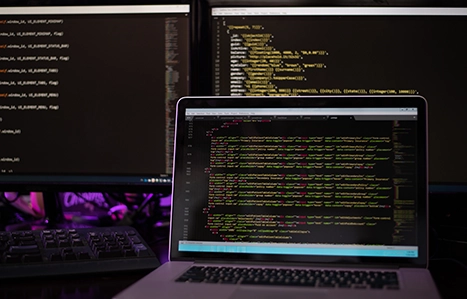 Computer Screens with data script on