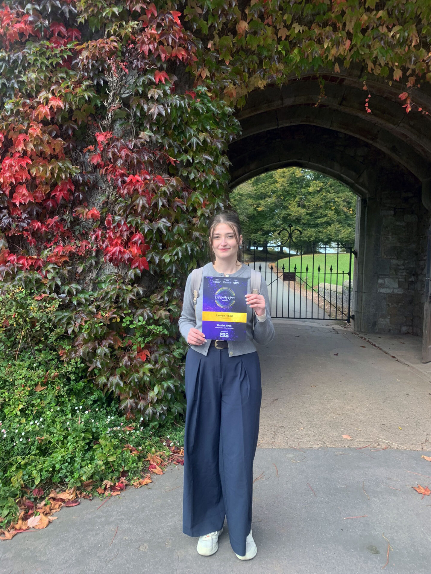Apprentice holding a certificate