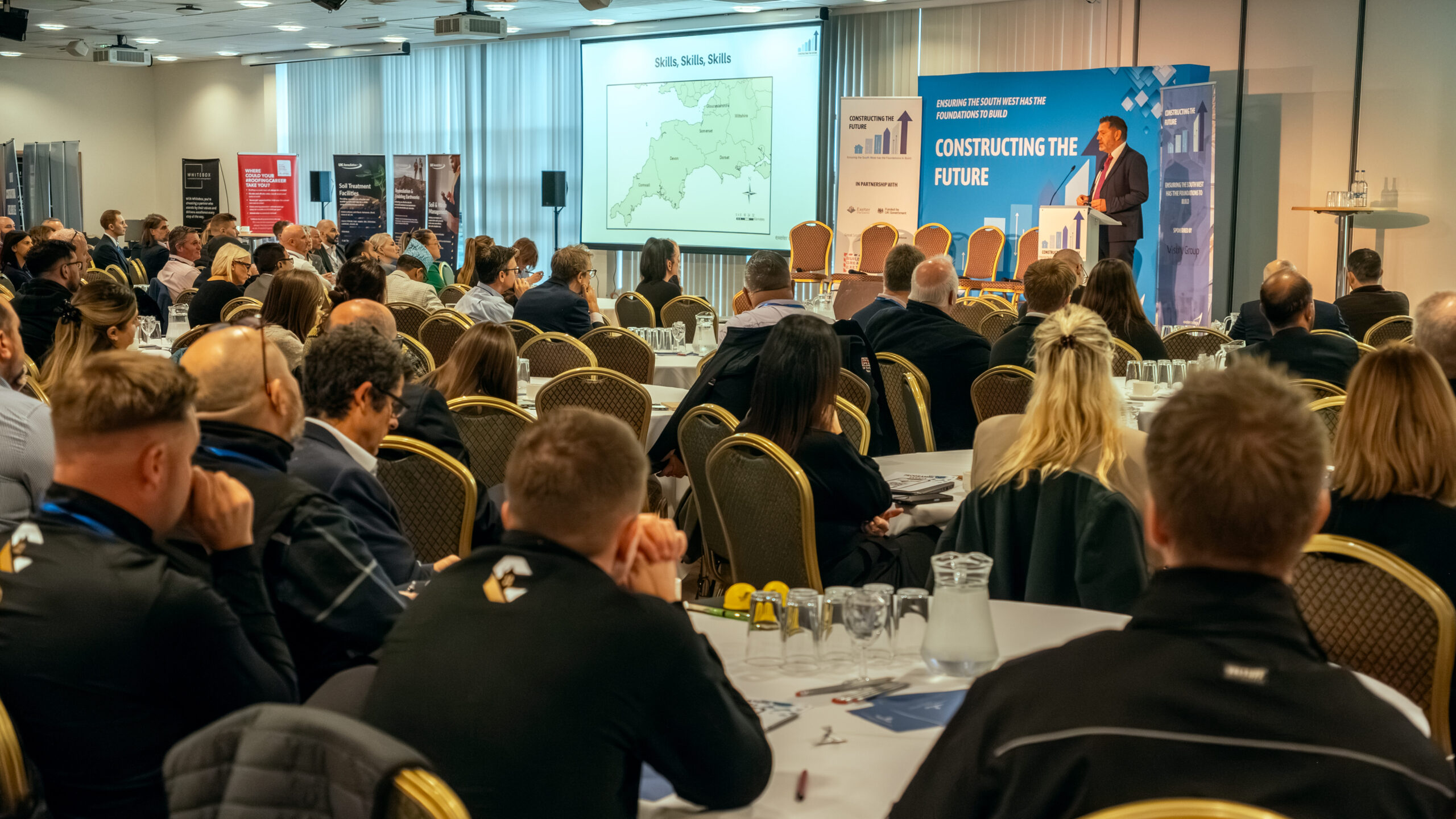 A keynote speaker presents at an event. 