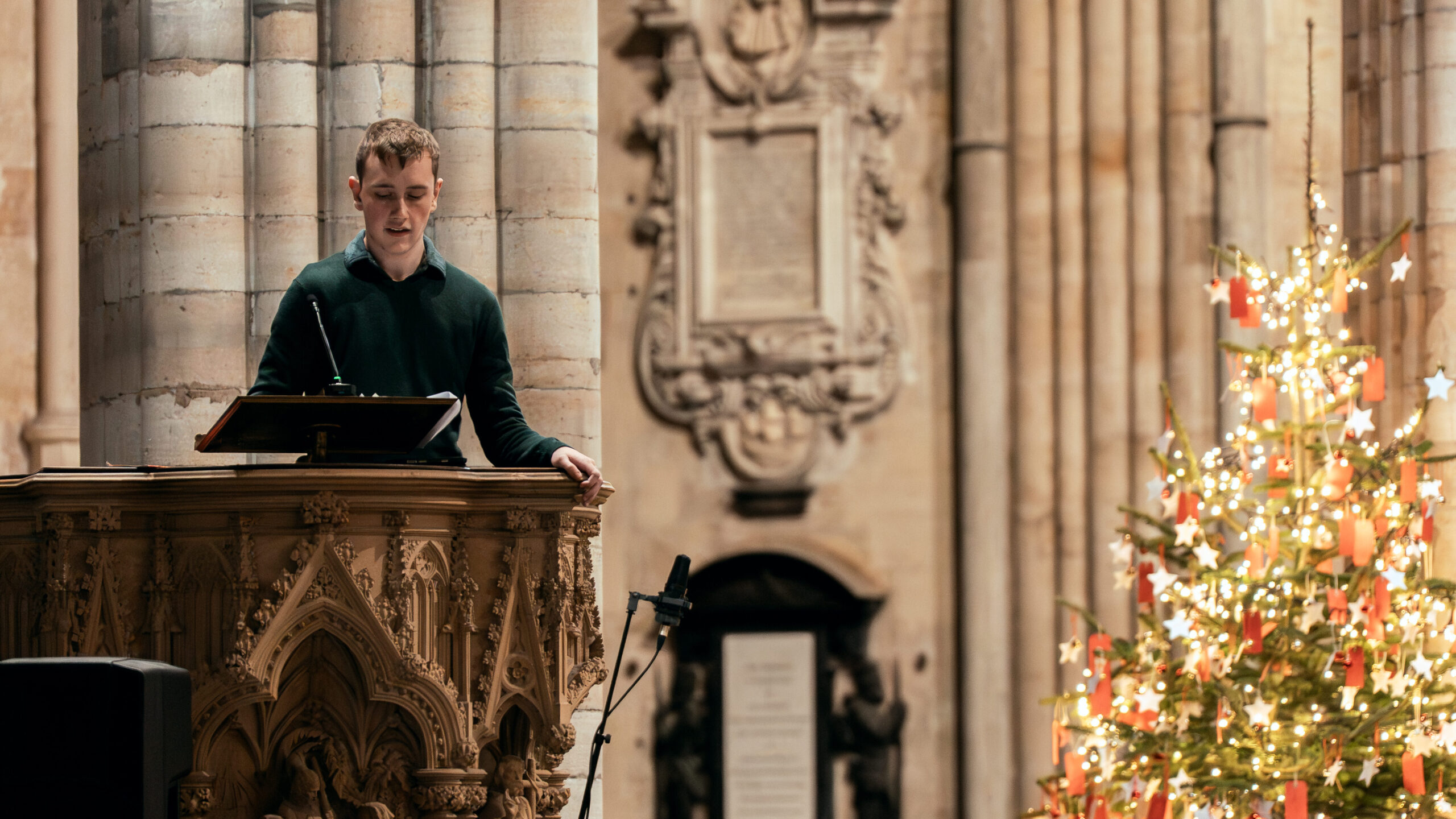Person reading from a pulpit