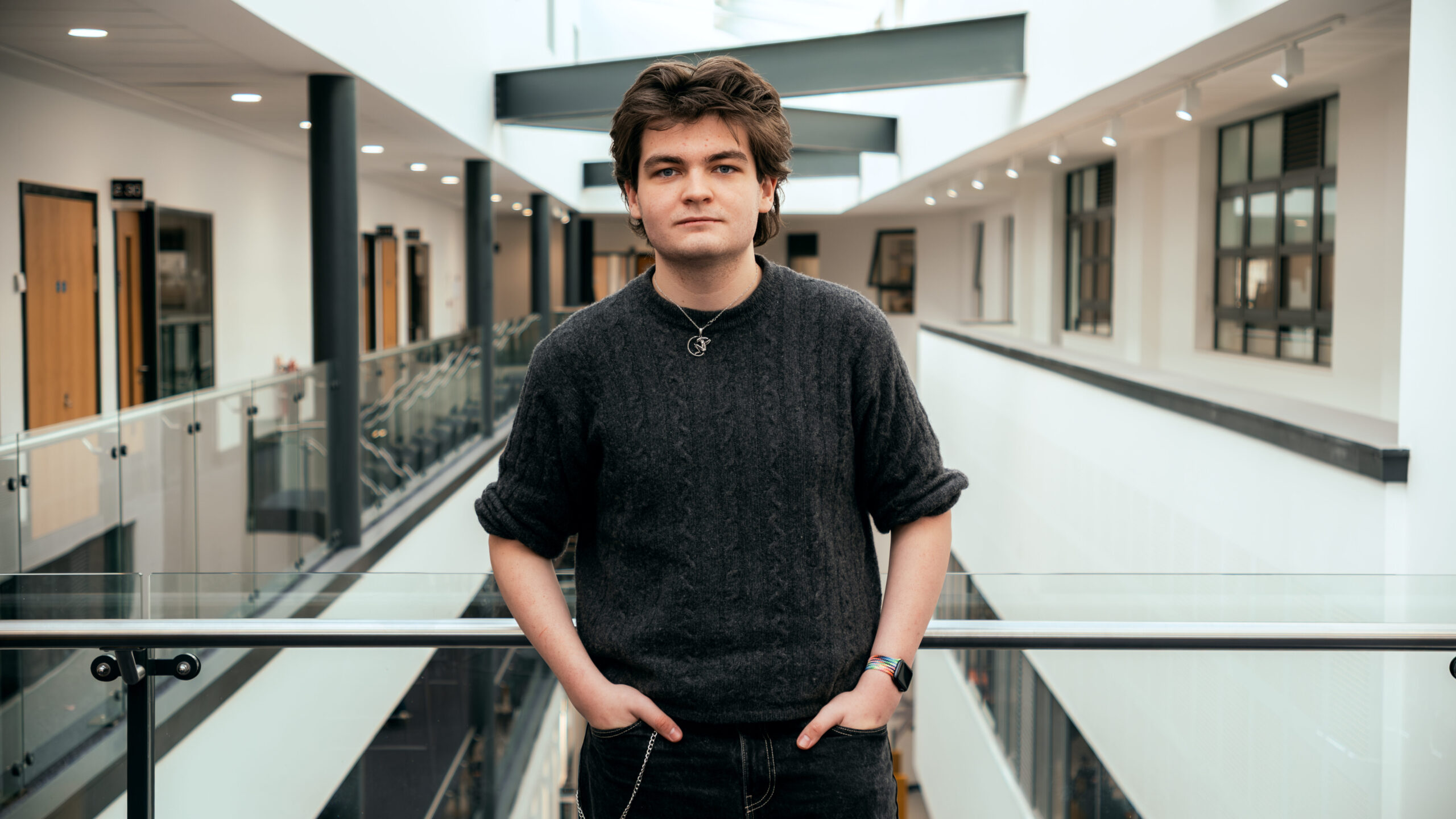 Student standing in a college