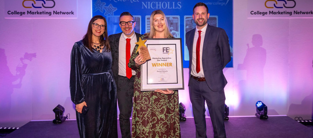 Female staff winning award at College Marketing Network