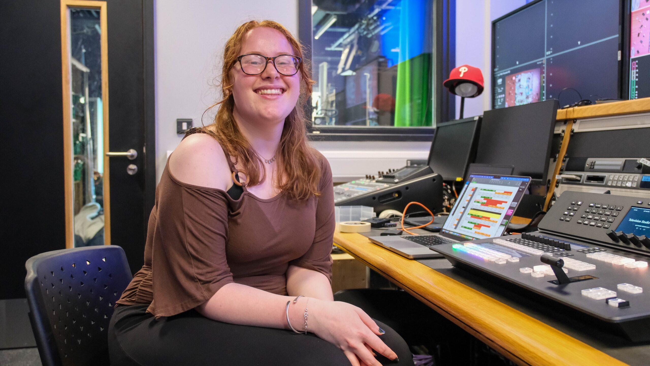 Exeter College Learner smiling in a studio
