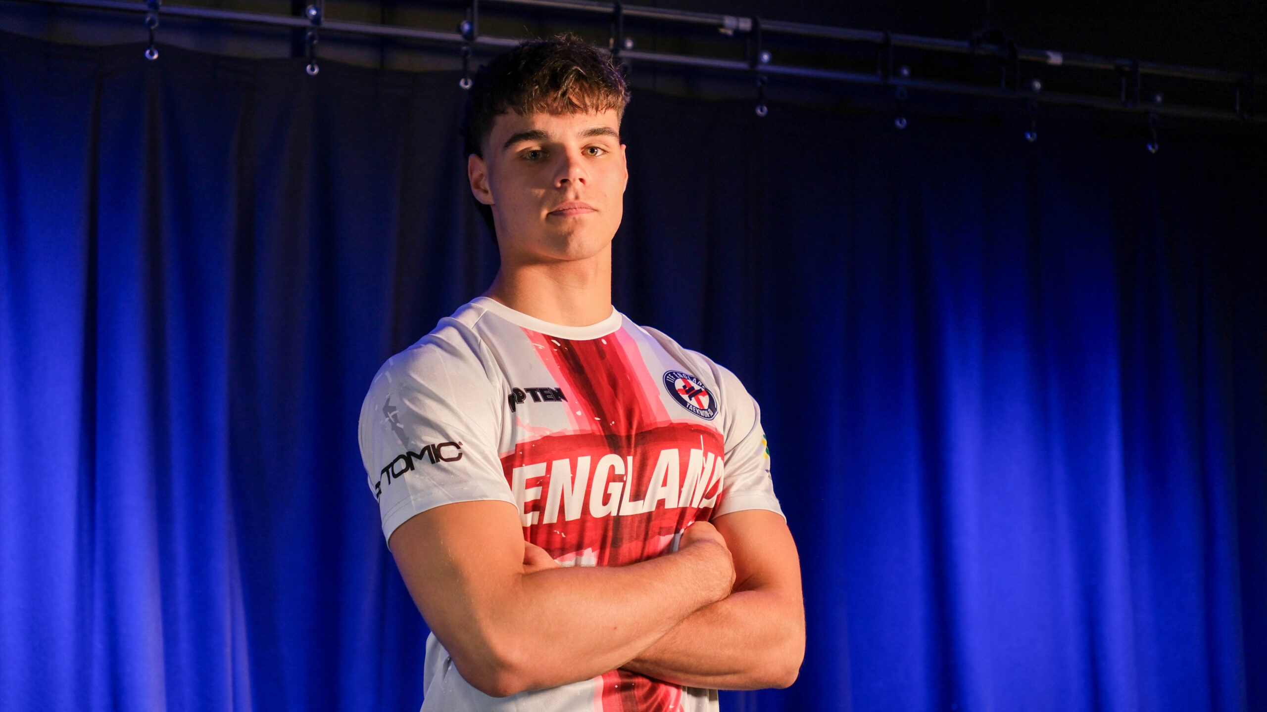 Exeter College student in an England shirt