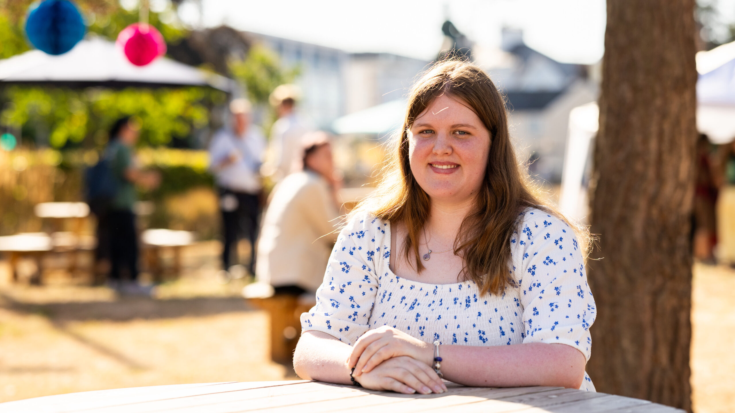 Exeter College Learner sat at a table