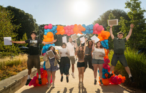 Exeter College learners jump and celebrate results