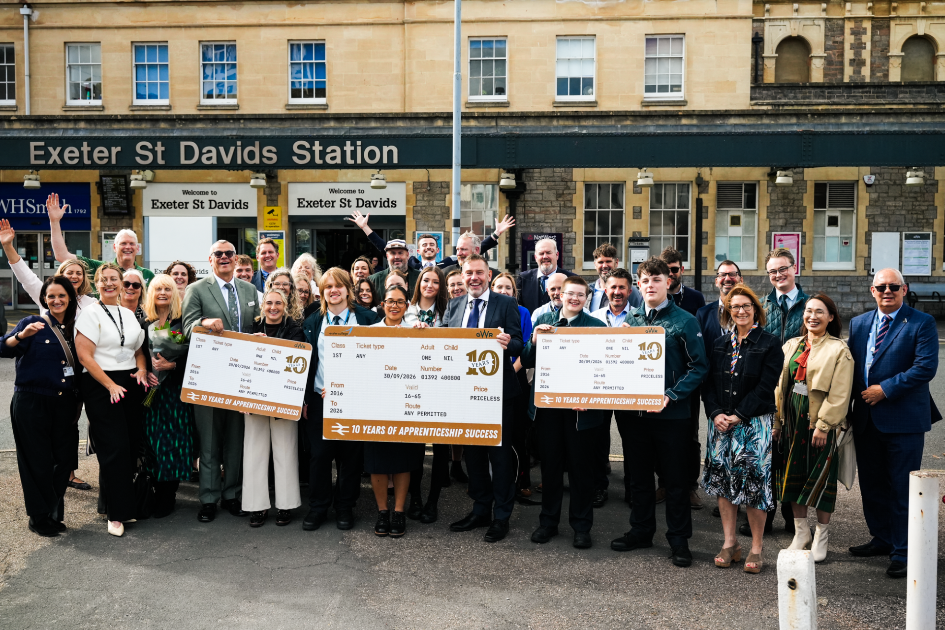 GWR and Exeter College staff outside Exeter St Davids train station